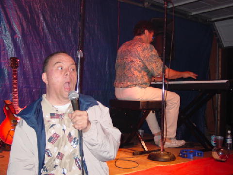 Art singing &quot;God Bless America&quot;, at 4th of July family picnic 2003